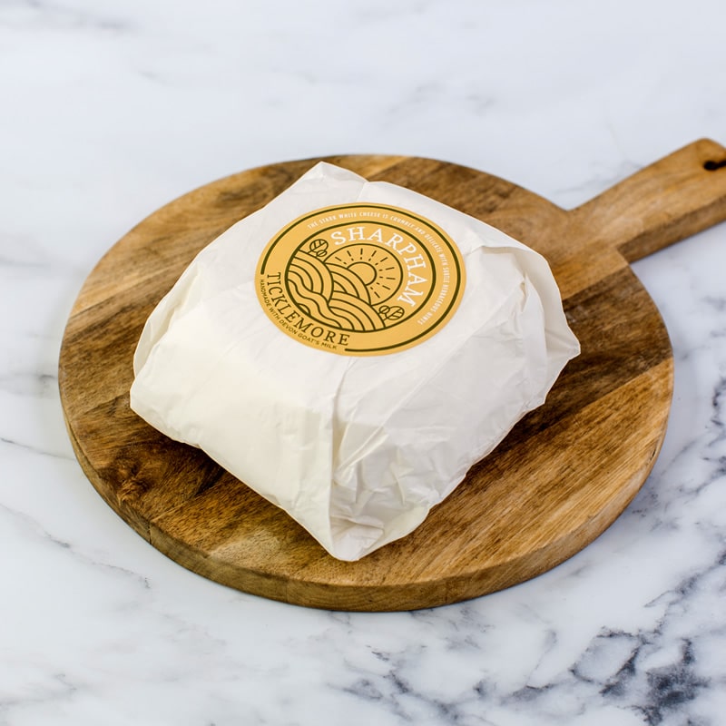 Sharpham Ticklemore Goats' Cheese wrapped with branded label